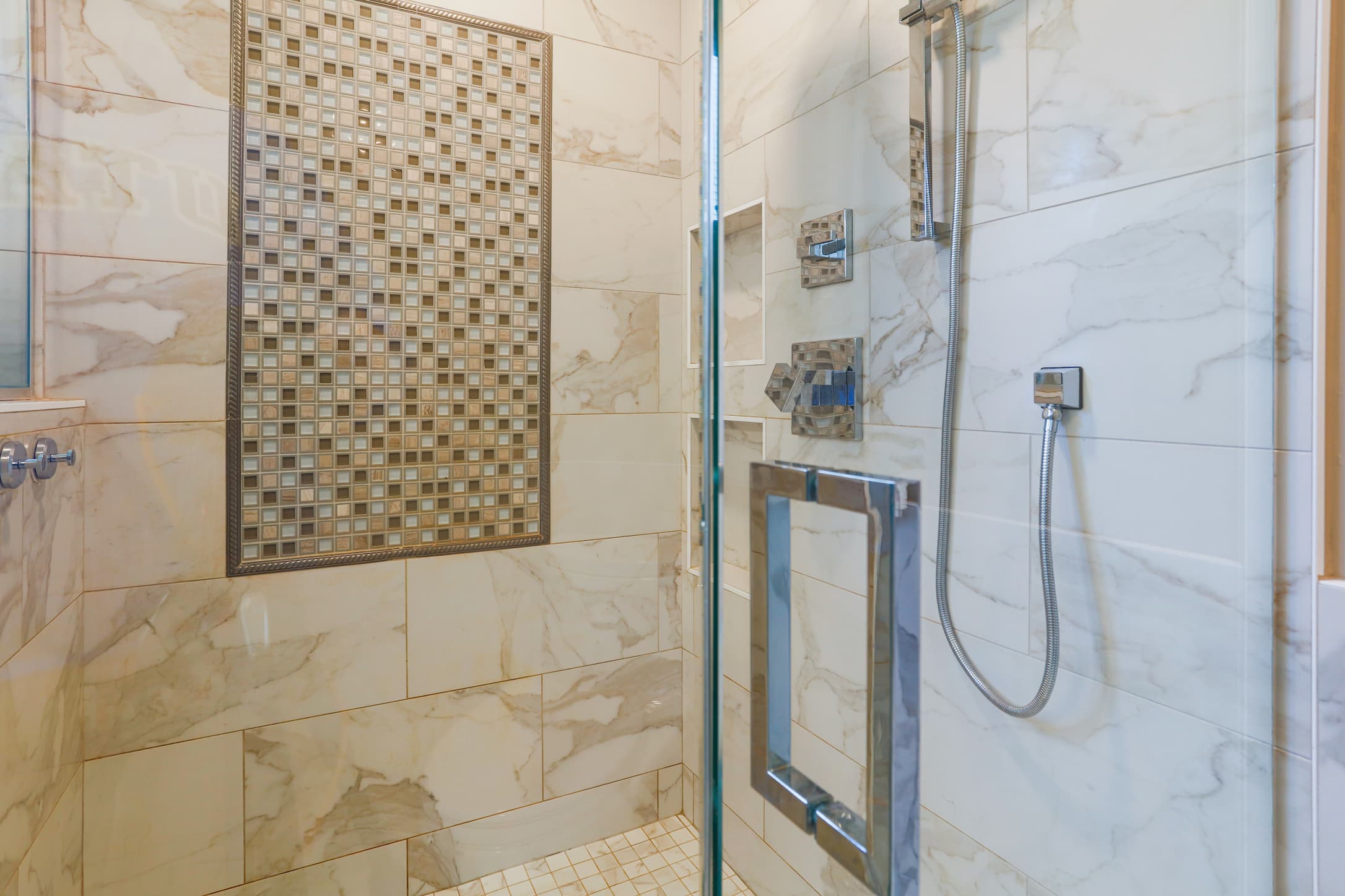 West Bloomfield Bathroom Remodeler with mosaic tile walls