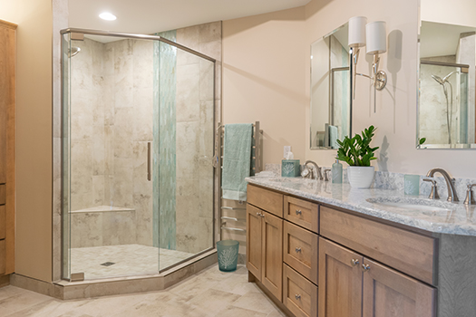 Sleek Shelby Township bathroom remodel featuring a stylish vanity and walk-in shower.